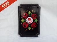 Rectangular Pottery Wall Plaque, black background,  hand-painted with traditional canal rose design.